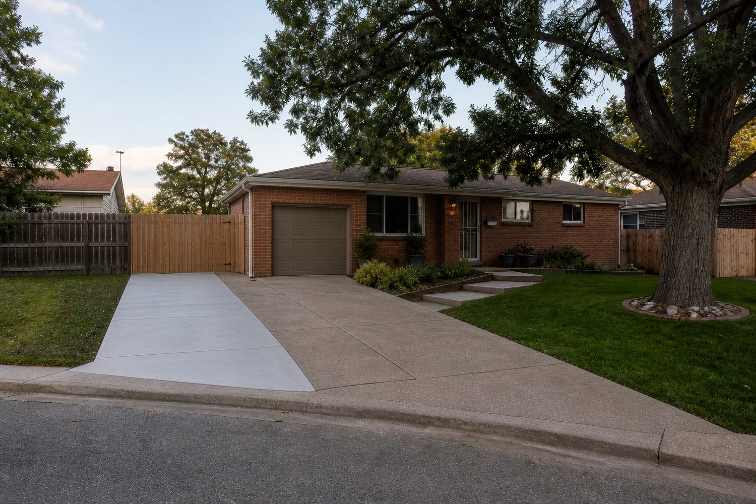 Concept example of a driveway widening beside an attached garage