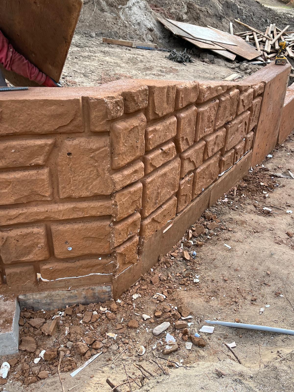 Textured concrete retaining wall
